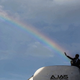 Illustration for article titled President Obama Shoots a Rainbow From His Hand in Jamaica